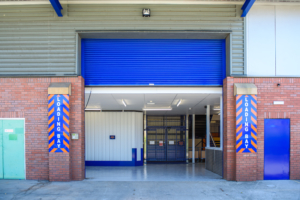 Large loading bay with blue roller shutter