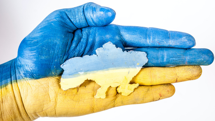 Ukraine Flag painted on a person's hand.